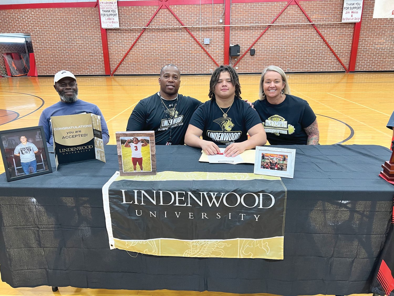 Maurice “Reece” McClain, Jr., signed his letter of intent to be an olympic weightlifter for Lindenwood University in St. Charles, Missouri.